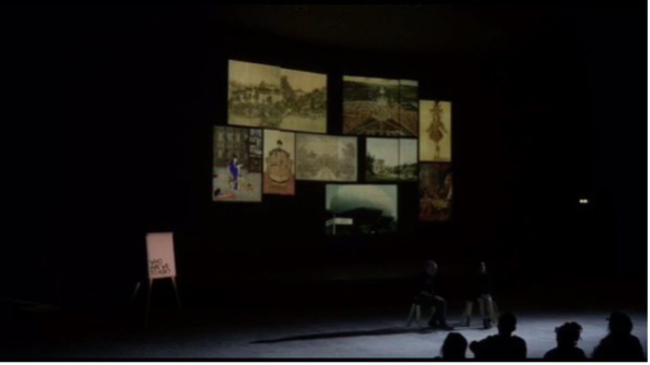 A picture containing text, indoor, darkDescription automatically generated